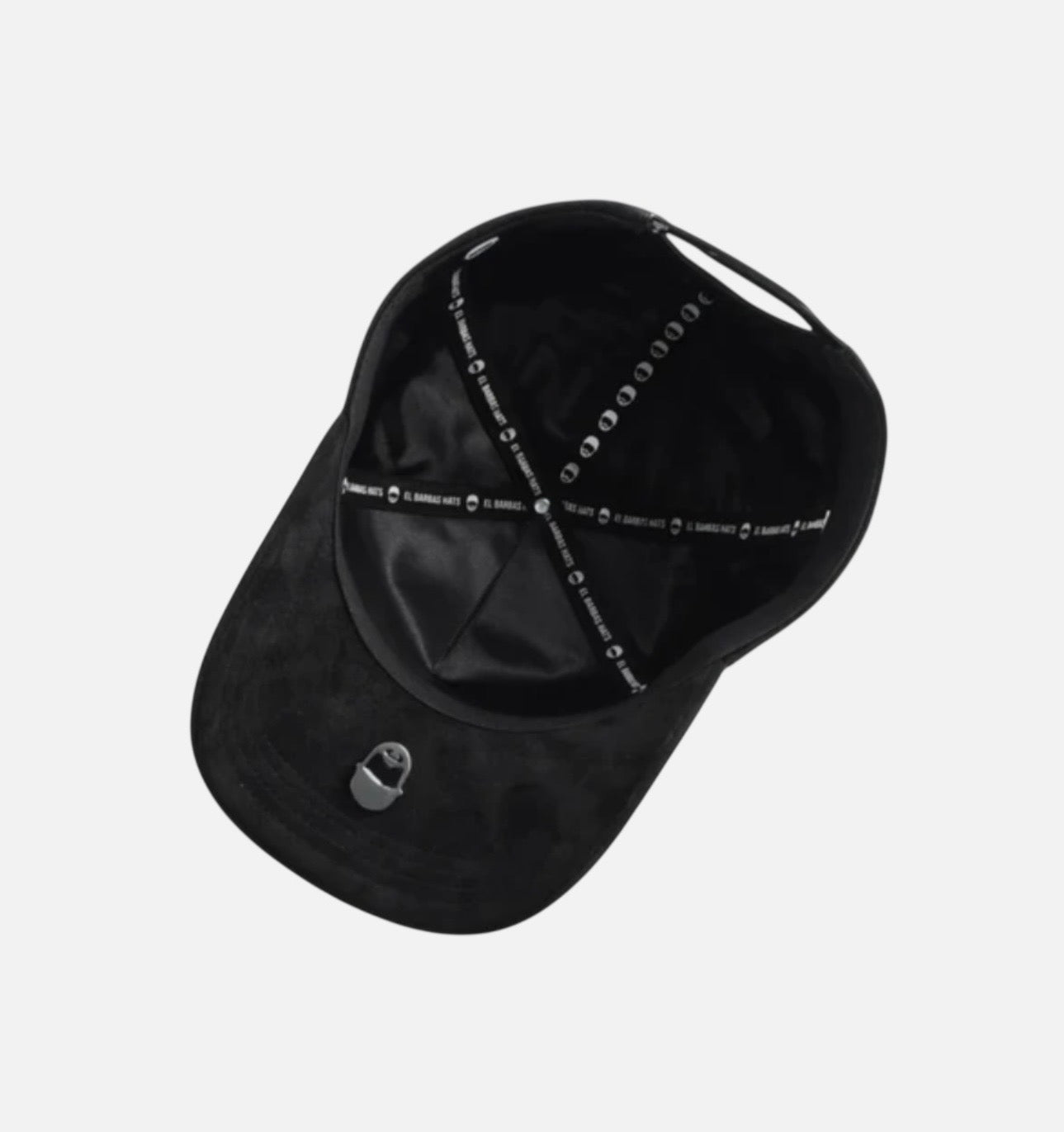 Hats featuring a black design with metal cross embellishments
